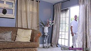 The ebony step daughter participates in a group scene.