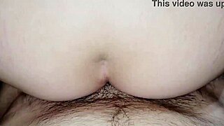 Wife rides husband in quick anal session, reaching orgasm together.