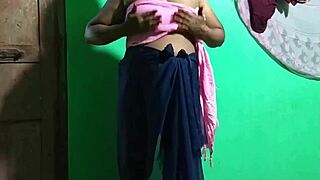 Is this wife masturbating with a cucumber?