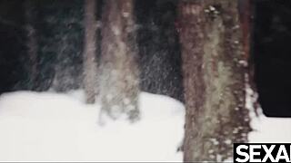 cute couple warms up with intimate touches on snowy day