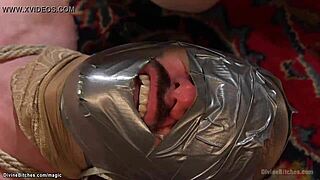 Busty femdom torments my bound slave with wild strapon action.