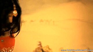 Oriental beauty dances sensually to showcase her exotic charm in nude performance.