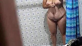 Hidden cam catches curvy Venezuelan neighbor in steamy shower