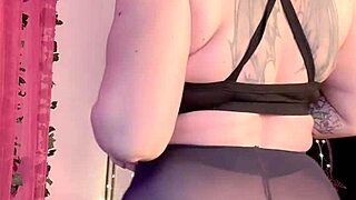 girl rubs her hairy pussy in black pantyhose to orgasm