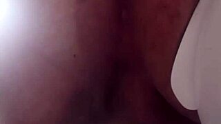 A gay stud enjoys close-up anal play with big dildos, leading to lactation