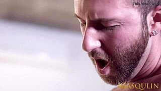 Muscular gay men Ace Quinn and Tanner Hall have rough sex without a condom in a Masqulin video