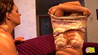 Two lesbian friends, brunette and blonde, having fun with dildo anal in bikinis.