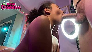A beautiful black girl gives a great blowjob with facial and cum shower in an interracial scene