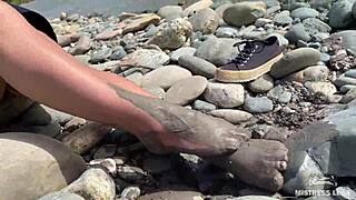 Goddess Teases With Messy Nylon Feet On River Bank