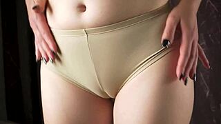 Just chilling with a camel toe tease in vintage panties.