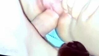 How does this masked beauty handle cum all over her ass?