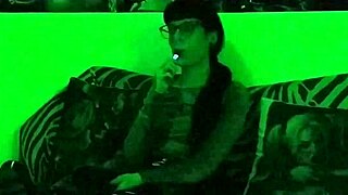 sexy goth mistress smokes a cigarette