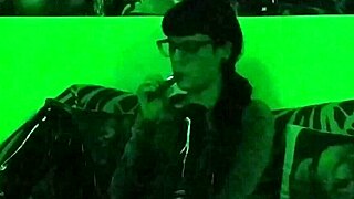 sexy goth mistress smokes a cigarette