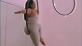 Pinay babe pole dances in heels, mastering aerial hoops