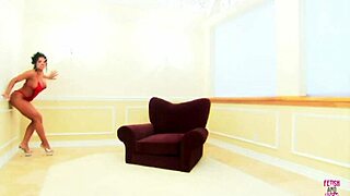 brunette bimbo with huge fake breasts gets pounded. her cunt drilled hard in retro armchair.