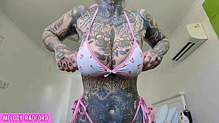 cheeky milf mommy tries on bikinis with her big tattooed curves! 👙