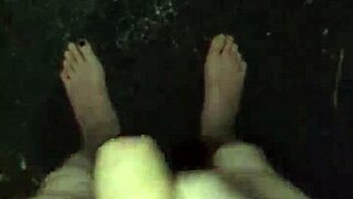 Masturbating in the rain, this guy goes wild with his huge tool.