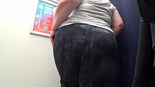 Look at this! Camera catches curvy milf's big ass in satin panties while changing in fitting room