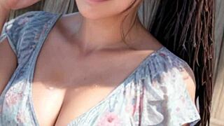 Mature woman strolls on the beach 😊