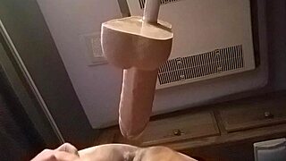 I'm bent over in doggystyle, sliding the huge dildo into my pussy