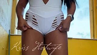 A wife in new short shorts is doing exercises with her friend