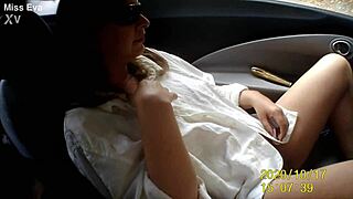 I'm masturbating with my dildo naked in the car.