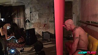 Two cocks, two pussies, and a harness in the dungeon