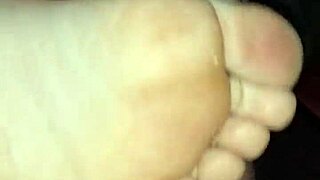 Watch this homemade bare footjob leading to big cumshot.