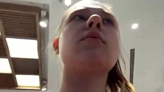 Young girl masturbates with dildo in locker room