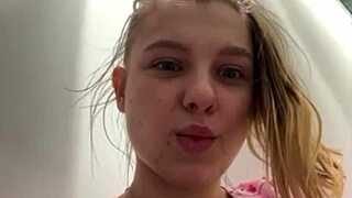 Young girl masturbates with dildo in locker room