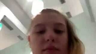 Young girl masturbates with dildo in locker room