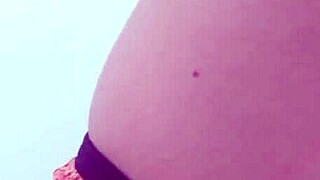 Brazilian woman chats while getting ready for work.