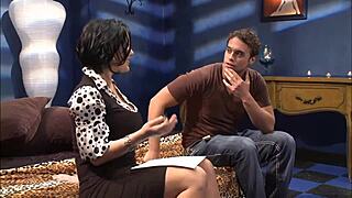 Claire awaits her scene with a handsome guy