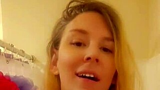 In the shower, she gets wet and starts touching herself sensually.