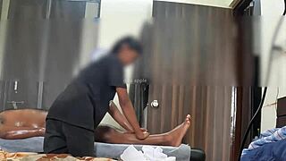 Hidden cam catches the masseuse giving a happy ending with her hands