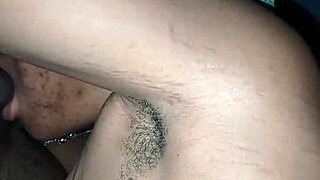 Nigerian girlfriend rides cowgirl passionately, whispering dirty talk while licking natural tits 😏