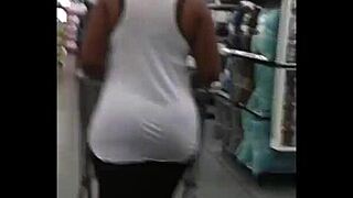 I spotted this candid moment of a stacked black woman with basketball booty and natural tits.