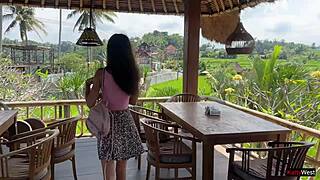 Skinny brunette flashes tight pussy in public cafe then gets facial from waiter.