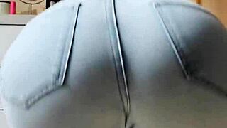 homemade video of petite blonde teen doing striptease dance in tight jeans in bedroom