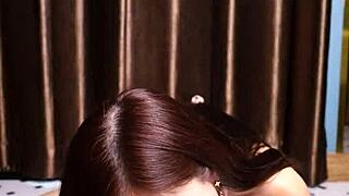 april maxima starts by sucking a dildo. then she delivers an intense footjob with her skinny cute petite asian body.