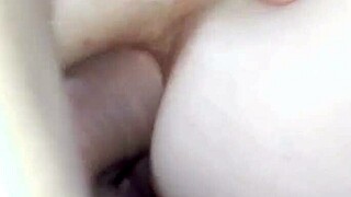 husband records intimate homemade moment with wife in bedroom setting