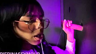 i'm a sexy brunette with a big ass taking on two huge cocks through the glory hole