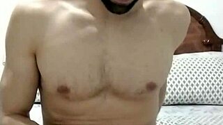 this attractive guy reveals his tight ass while jerking off his massive cock slowly