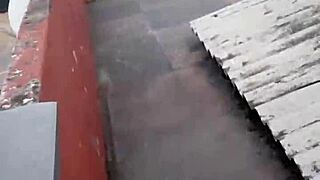 On the balcony, sucking and giving up the pussy outdoors