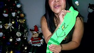 Hey, why not join the fun with this huge sexy Grinch in balloon play and flashing those big natural tits? 😈