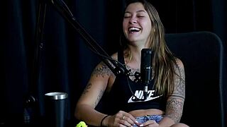 Flor de Damiana enjoys the exhibitionist side with Kidi Bengala in a see-through red outfit during a wild swinger interview full of domination and group orgasm fun outdoors.