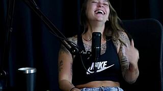 Flor de Damiana enjoys the exhibitionist side with Kidi Bengala in a see-through red outfit during a wild swinger interview full of domination and group orgasm fun outdoors.