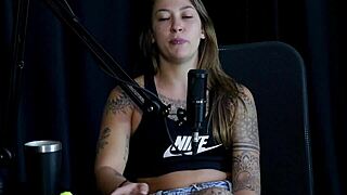 Flor de Damiana enjoys the exhibitionist side with Kidi Bengala in a see-through red outfit during a wild swinger interview full of domination and group orgasm fun outdoors.