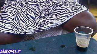 Hey check out this hot housewife flashing shaved pussy at public bar voyeur style