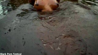 skinny african hottie teases softly in water